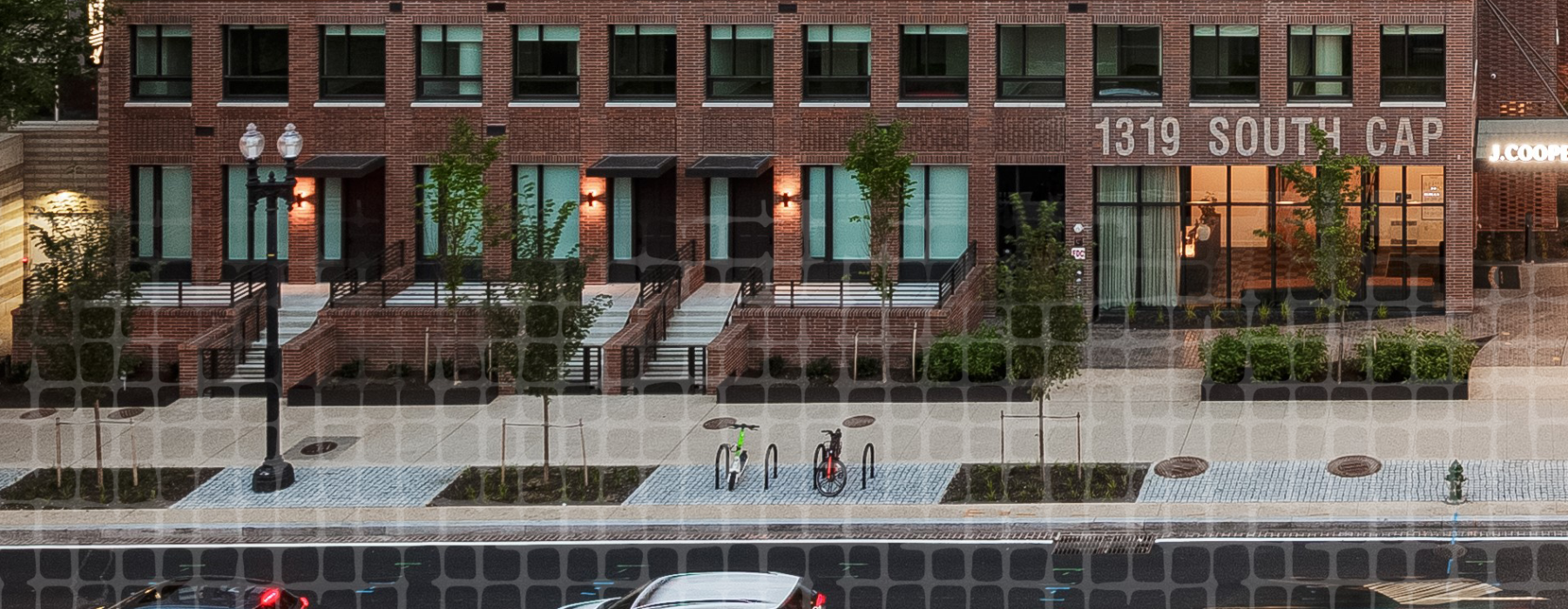 exterior view of townhomes with stairs and terraces