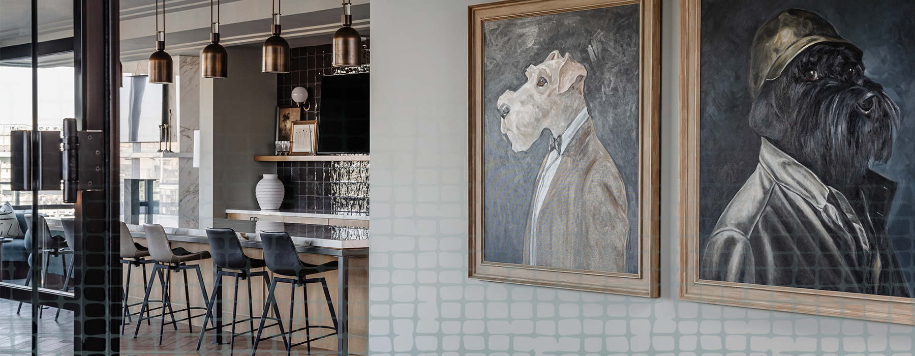 clubroom with bar seating and portraits of dogs in the foreground