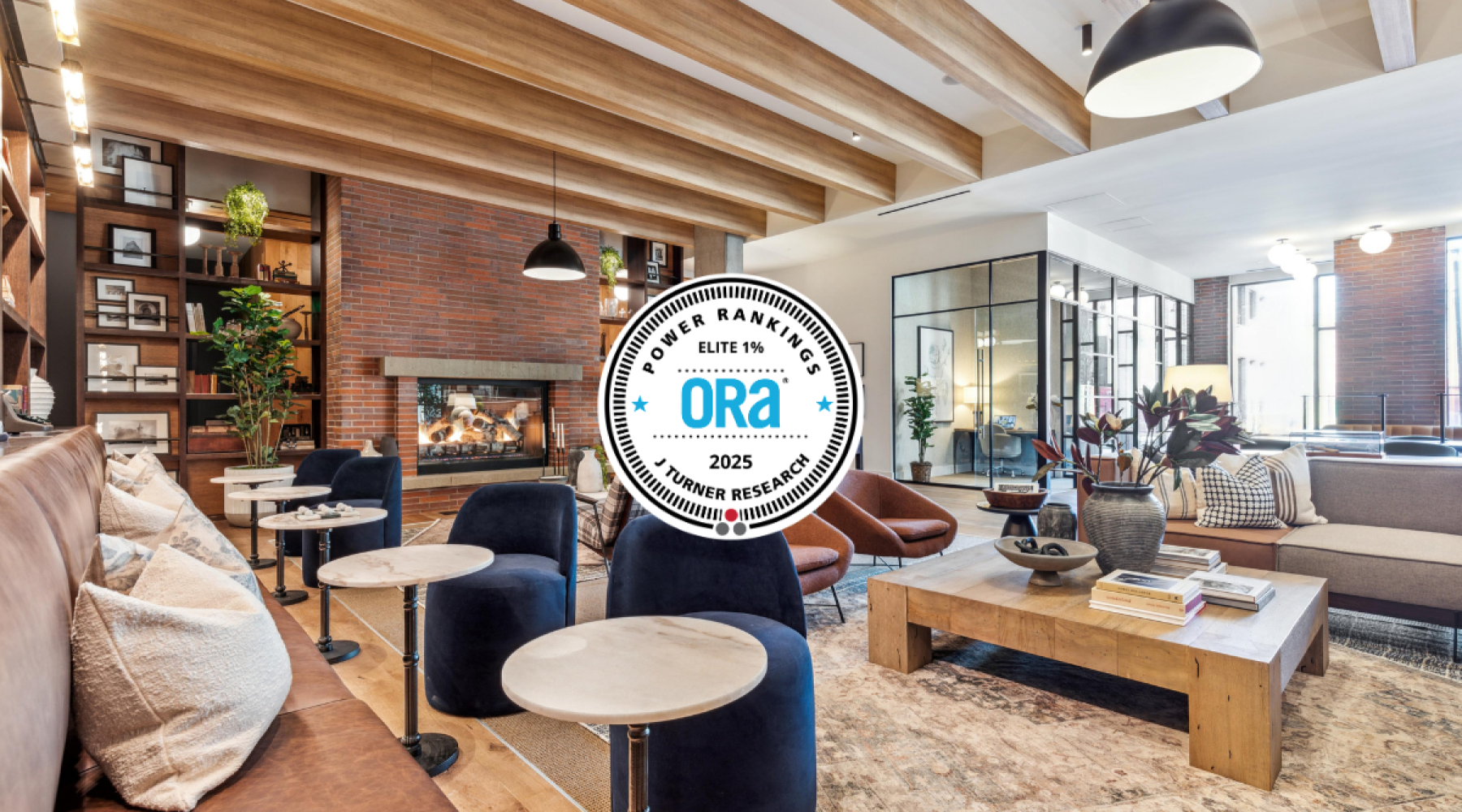 lounge area with seating tables and fireplace J Coopers Row luxury sw dc apartments ballpark